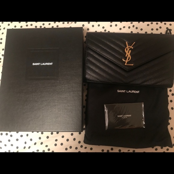 large monogram quilted leather wallet on a chain saint laurent